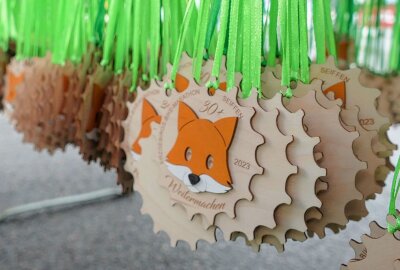 31. Erzgebirgs-Bike-Marathon: Wenn die Schlammschlacht zum Genuss wird - Ein Fuchs zierte die diesjährigen Teilnehmermedaillen. Foto: Andreas Bauer