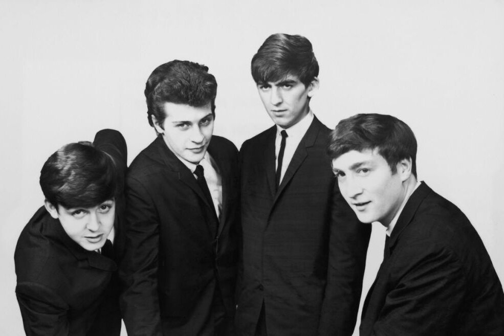 Die frühen Beatles: Pete Best (zweiter von links) mit seinen Ex-Bandkollegen Paul McCartney (links), George Harrison (zweiter von rechts) und John Lennon.

