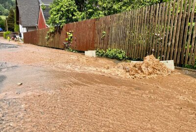 Erneut massive Überschwemmungen in Lauter - Überschwemmungen in Lauter. Schlammmassen geraten in die Grundstücke der Anwohner. Foto: Daniel Unger