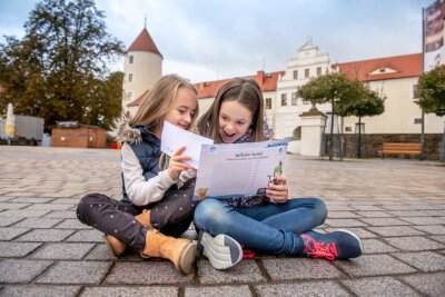 Mit dem Kinderstadtplan der Tourist-Information kann man  Stempel sammeln und Preise gewinnen.
