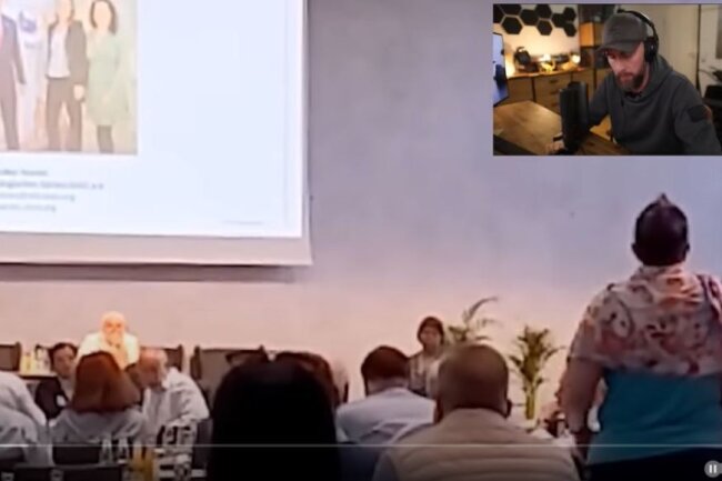 Thema verfehlt! 6! Setzen!: Video leaked neue Zoo-Mission gegen Influencer - Auf der Sitzung vom VdZ meldet sich eine Frau aus dem Publikum zu Wort. Screenshot aus "GEHEIME AUFNAHMEN: Zoos wappnen sich vor INFLUENCERN" von Robert Marc Lehmann auf Youtube
